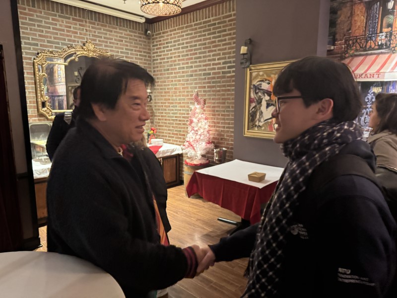Hayden Celebrates Christmas at the Flushing YMCA Board Party
