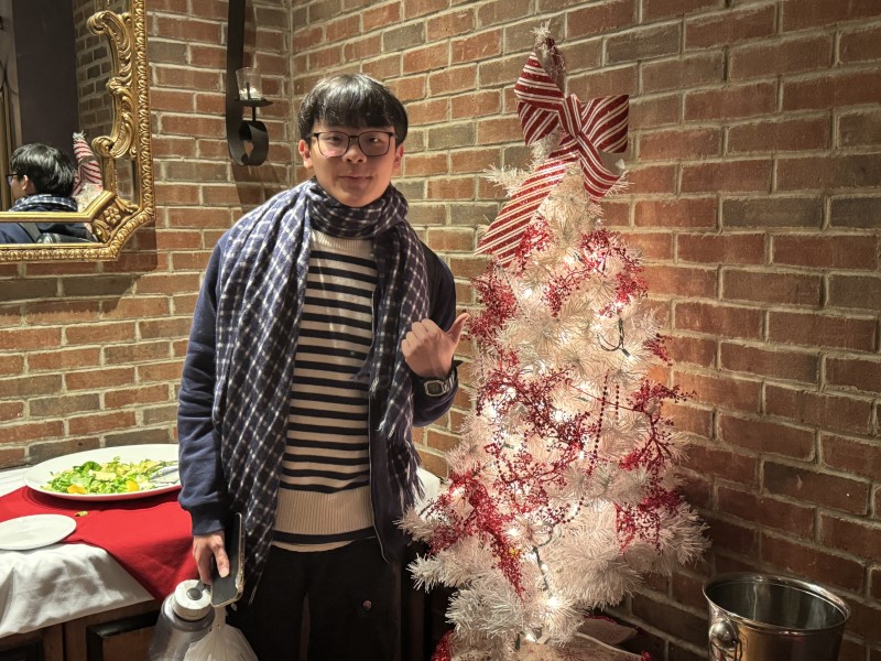 Hayden Celebrates Christmas at the Flushing YMCA Board Party
